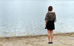 portrait of ali sickles at oliver smith's memorial at wing lake beach in bloomfield hills michigan